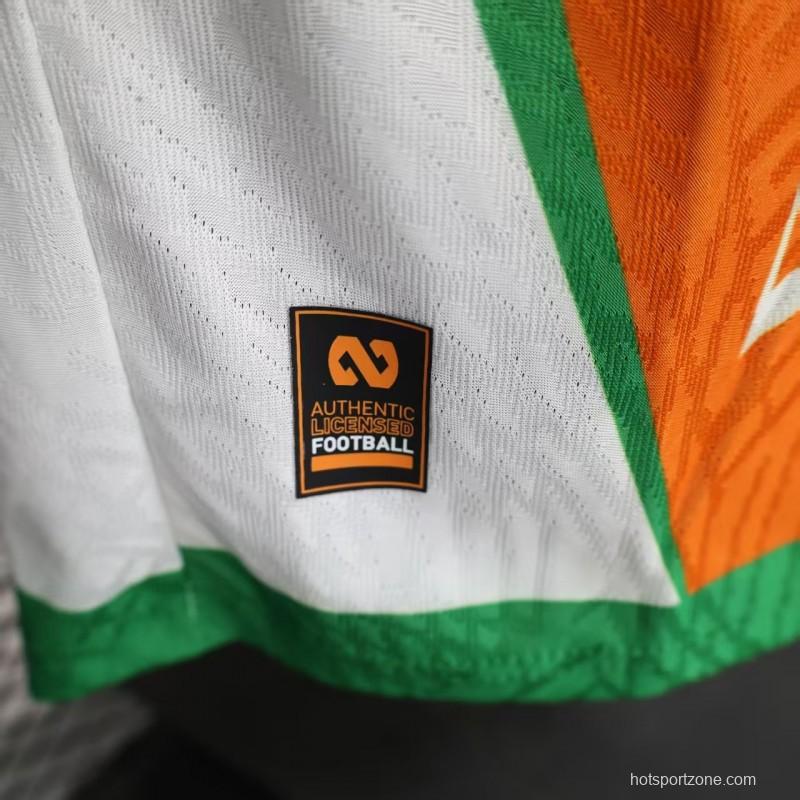 Player Version 2025 Ivory Coast Orange with Elephant Graphic and Green Accents Jersey
