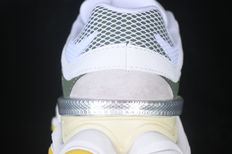 New Balance 9060 Retro Running Shoes with ABZORB Cushioning and Mesh Suede Upper - U906089D